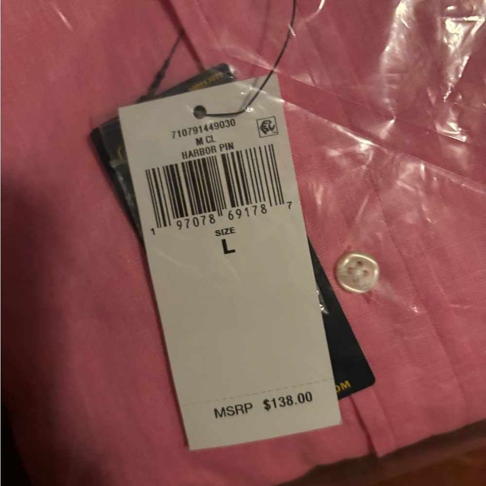 pink men’s polo. Never worn still in the plastic and original box it came in. - Picture 3 of 5